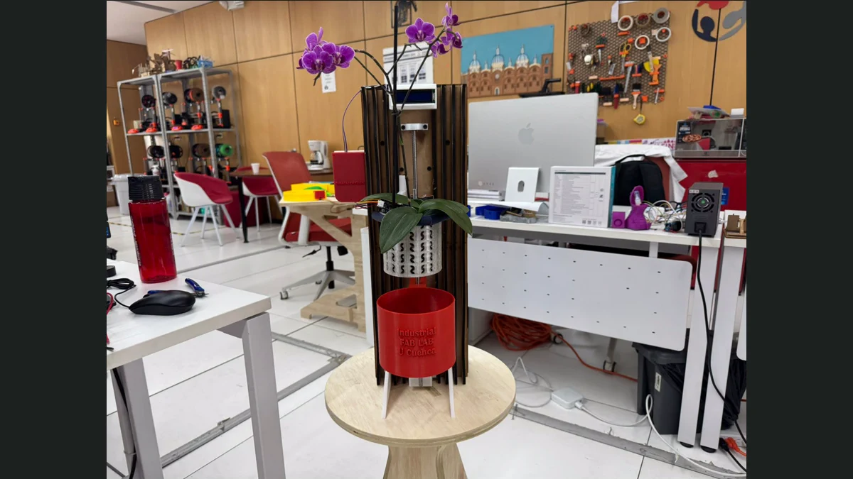 A real Fab Academy kinetic-orchid final project photographed inside its fabrication lab.