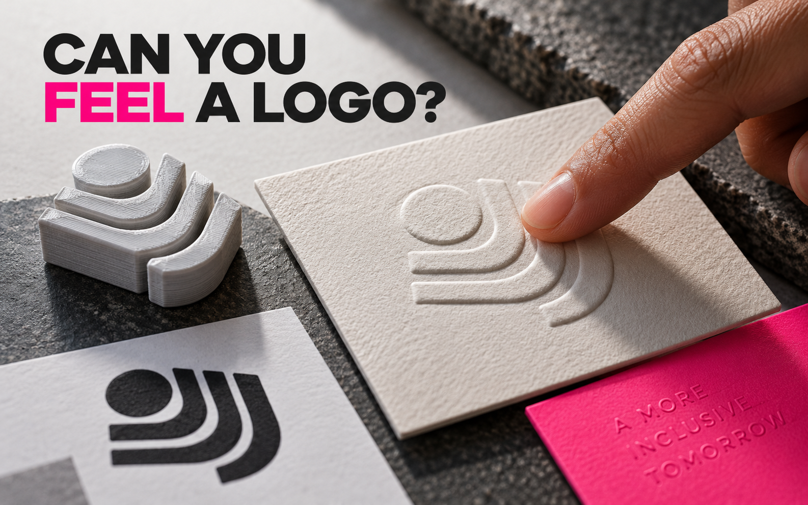 A tactile logo system made from raised shapes and high-contrast marks.